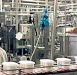 Decontactor provides overhead connection for production line.